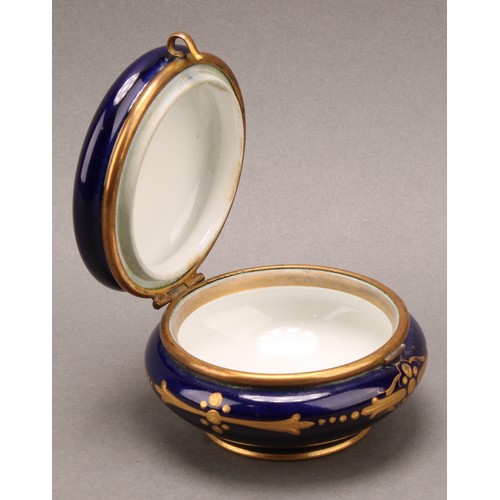 269 - A 'Sevres' porcelain circular dressing table box, the hinged cover painted with two children releasi... 