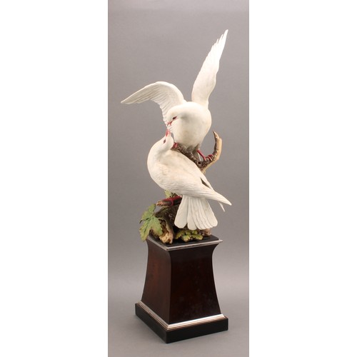 156 - A Royal Worcester porcelain model, White Doves, modelled by R. Van Ruyckevelt, to commemorate the Si... 