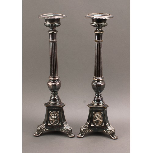 678 - A pair of 19th century silver plated Corinthian column tapering alter candlesticks, gadrooned everte... 