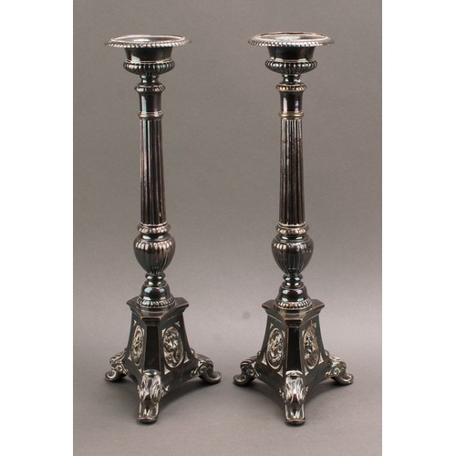 678 - A pair of 19th century silver plated Corinthian column tapering alter candlesticks, gadrooned everte... 