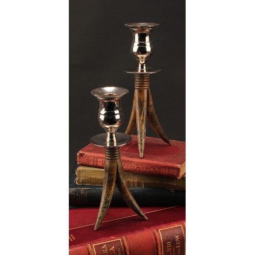 2352 - Modern Design - a pair of horn and silver plate mounted candlesticks, bell shaped sconces, ribbed co... 