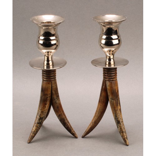 2352 - Modern Design - a pair of horn and silver plate mounted candlesticks, bell shaped sconces, ribbed co... 