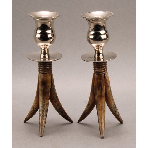 2352 - Modern Design - a pair of horn and silver plate mounted candlesticks, bell shaped sconces, ribbed co... 