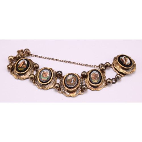 1213 - A late 19th century gilt brass Italian Grand Tour bracelet, applied with five micromosaic ovals depi... 