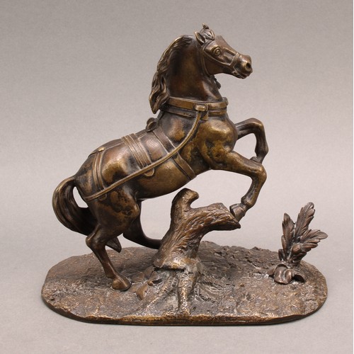 2079 - A 19th century Continental bronze, of a bolting stallion rampant, the base cast with flora, 18cm hig... 