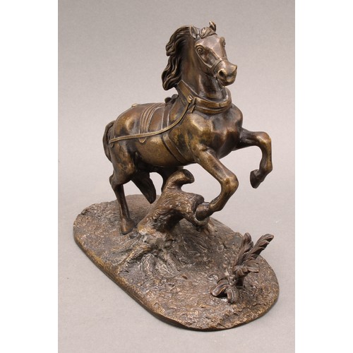 2079 - A 19th century Continental bronze, of a bolting stallion rampant, the base cast with flora, 18cm hig... 