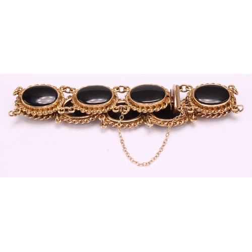 1272 - Vintage 9ct gold cabochon black onyx bracelet with safety chain, the bracelet consists of eight piec... 