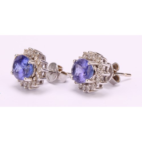 1171 - 18ct white gold Tanzanite and Diamond earrings, each earring contains an approx. 1.00ct (1 carat) ov... 