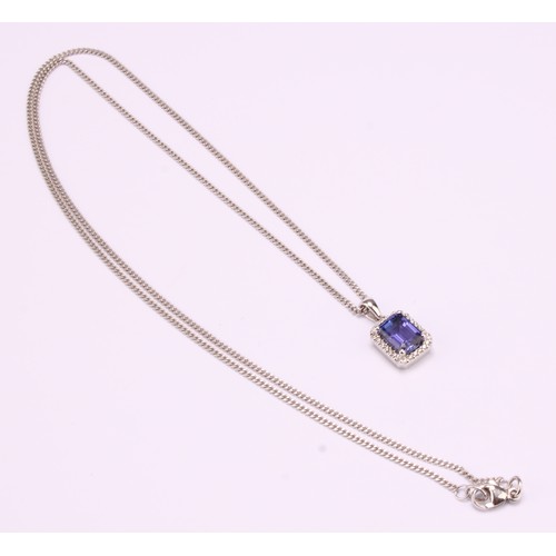 1172 - 18ct white gold Tanzanite and Diamond pendant necklace, the pendant set with an emerald cut approx. ... 