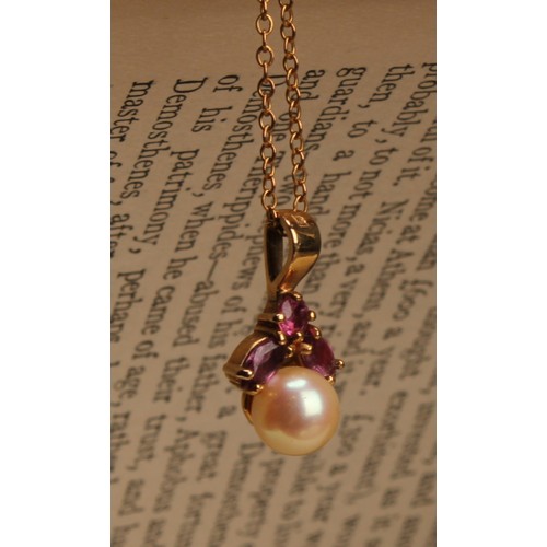 1175 - 9ct gold Cultured pearl and Ruby pendant necklace, pendant set with an approx. 6.16mm round cultured... 