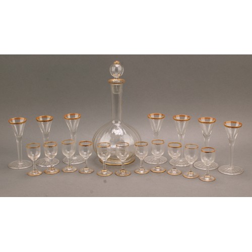 282 - A 19th century French glass harlequin liquor suite, comprising globular decanter and eleven glasses,... 