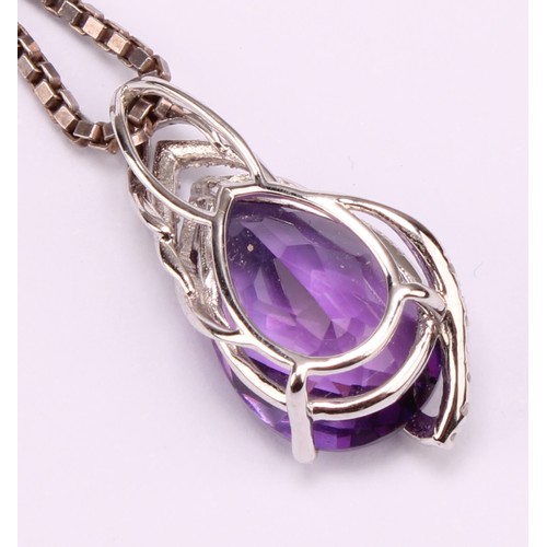 1182 - 9ct white gold Amethyst and Diamond pendant on a fine sterling silver box link chain, pendant is set... 