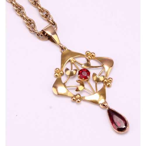 1270 - Unmarked yellow metal Art Nouveau style pendant with 9ct gold chain 
The pendant has a melee round b... 