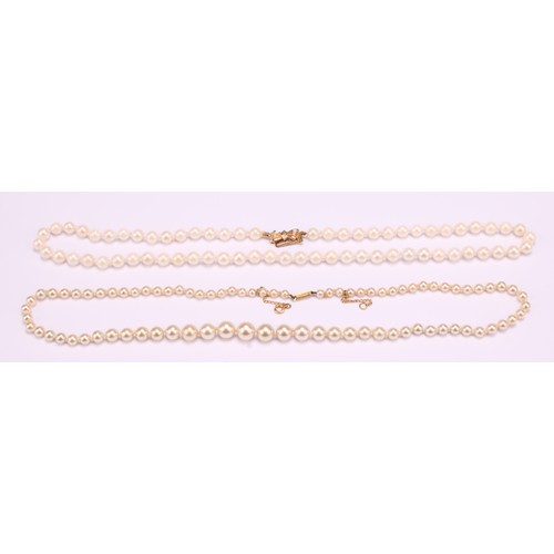 1268 - Two sets of Pearls; to include; a white approx. 5mm cultured pearl necklace with a bow design 9ct go... 