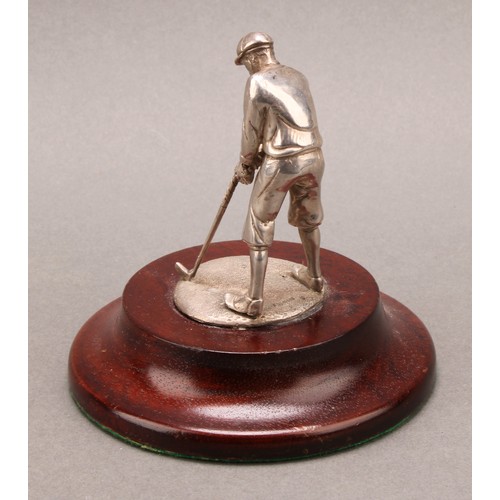 1104 - Golf - an Elizabeth II cast silver model, of a golfer, turned wooden base, 11cm high, Birmingham 199... 