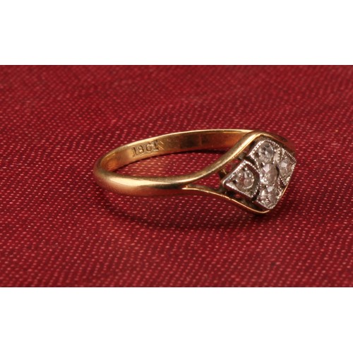 1252 - An Art Deco 18ct gold Old European Cut Diamond ring; set with five approx. 0.03ct Old European cut  ... 