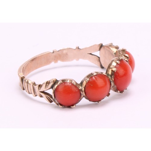 1234 - A Tested 9ct gold Coral ring,
set with five graduated round cabochon corals that measure between app... 