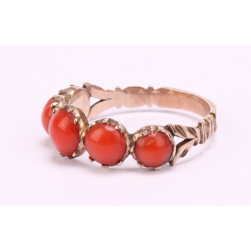 1234 - A Tested 9ct gold Coral ring,
set with five graduated round cabochon corals that measure between app... 