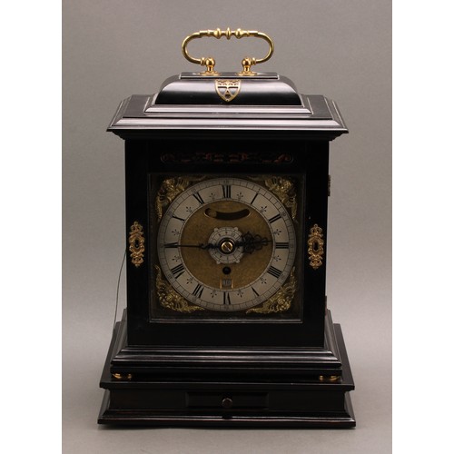 2450 - A George II style ebonised bracket alarm clock, the 15cm square brass dial with silvered chapter rin... 