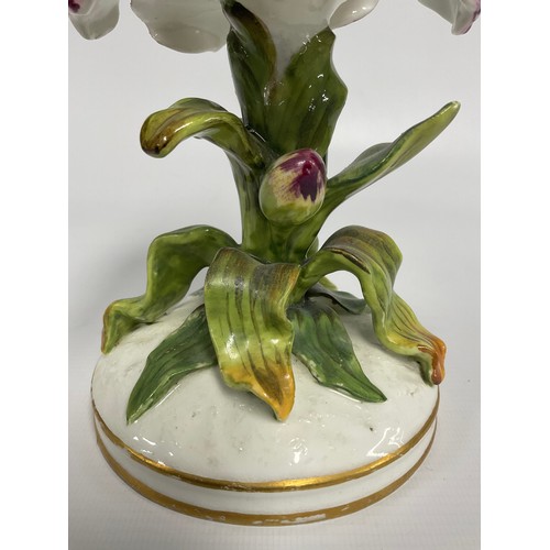 19 - A 19th century English porcelain tulip vase, the open flower raised on a leafy stem, circular gilt l... 