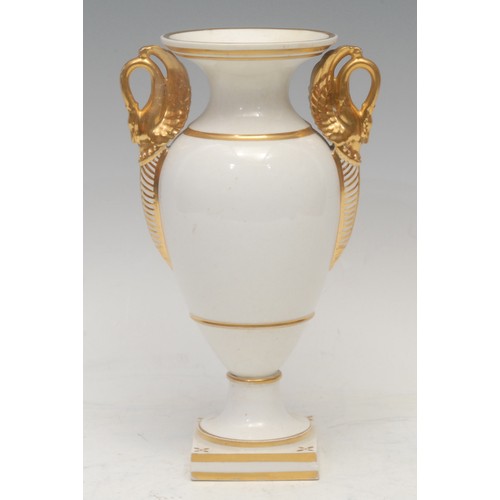 184 - A Derby two-handled pedestal ovoid vase, painted in the manner of Richard Dodson, with fanciful bird... 