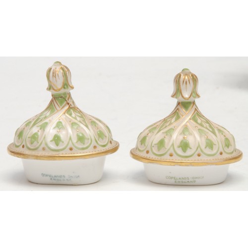 94 - A pair of Copeland two-handled pear shaped pedestal vases and covers, in the rococo manner, painted ... 