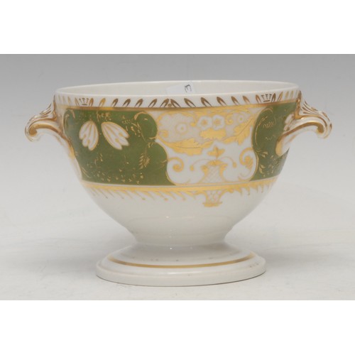 107 - A Royal Worcester bowl, in Japanesque style, painted with pink roses on gilt branches, yellow ground... 