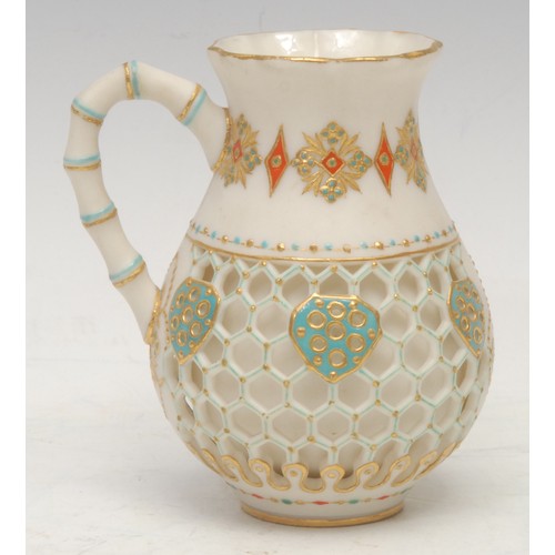 120 - A 19th century Royal Worcester double-walled jug, reticulated honeycomb outer, with pierced shields,... 