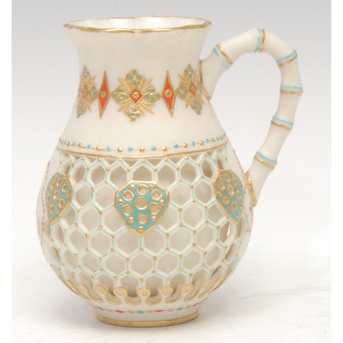 120 - A 19th century Royal Worcester double-walled jug, reticulated honeycomb outer, with pierced shields,... 