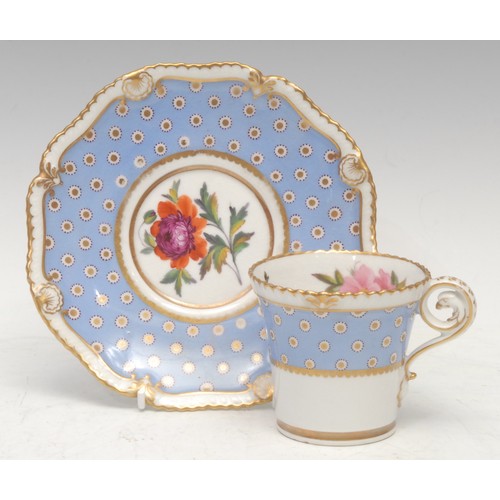 47 - A Chamberlains Worcester cup and saucer, painted with flowers within shaped gilt reserves, highlight... 