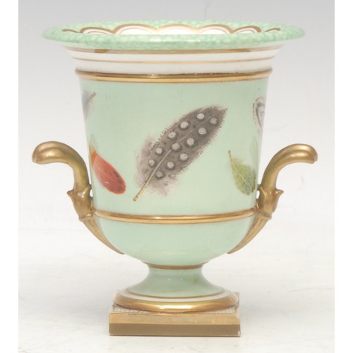 69 - A Flight Barr and Barr two-handled campana shaped vase, painted with scattered feathers on a lime gr... 