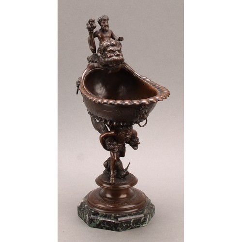 2078 - A 19th century Continental bronze pedestal dish, the everted and gadrooned rim mounted with Bacchus ... 