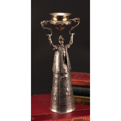 833 - A German silver figural wager cup, in the Renaissance taste, with a bearded man, bust length and wea... 