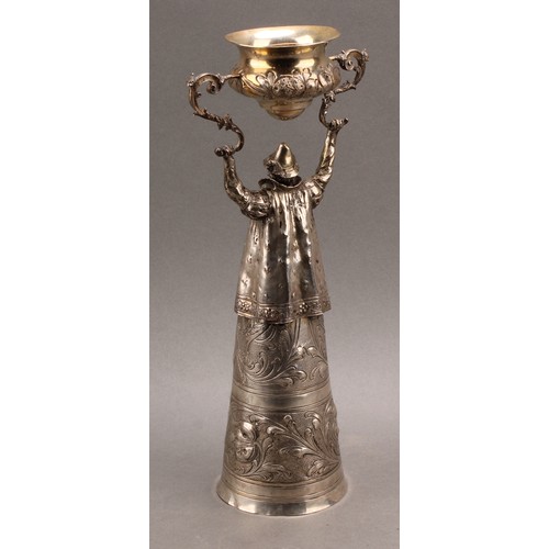 833 - A German silver figural wager cup, in the Renaissance taste, with a bearded man, bust length and wea... 