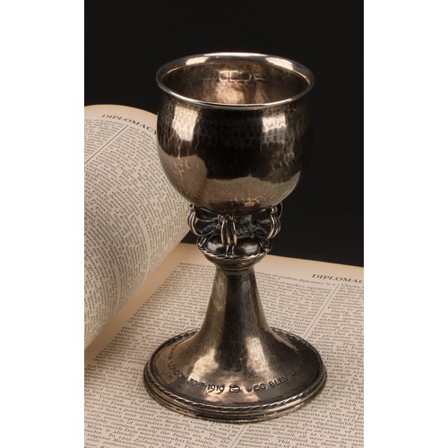 Omar Ramsden - an Arts and Crafts silver goblet, ovoid bowl with ...