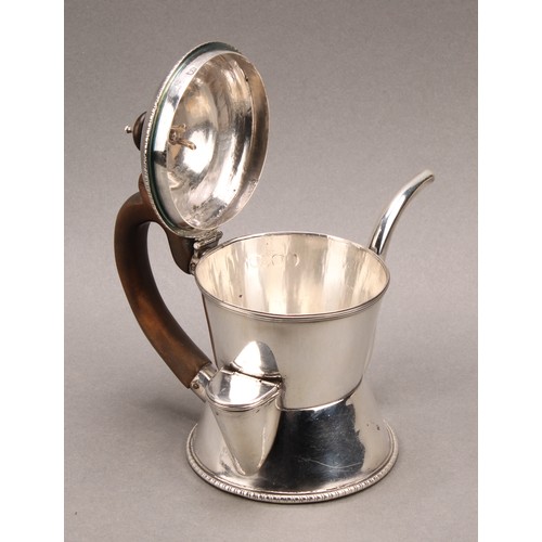 1017 - An early George III silver argyle, domed cover with shell shaped hinge, scroll-capped fruitwood hand... 
