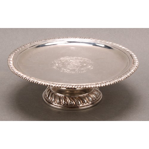 900 - A Queen Anne silver circular pedestal tazza, gadrooned border and domed foot, 13cm diam, London 1709... 