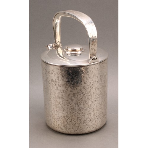 844 - A large Japanese silver cylindrical kettle, textured in the manner of an iron tetsubin, 26cm over ra... 