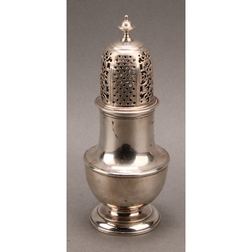 758 - A George II silver pear shaped sugar caster, pierced bell shaped cover with knop finial, domed foot,... 