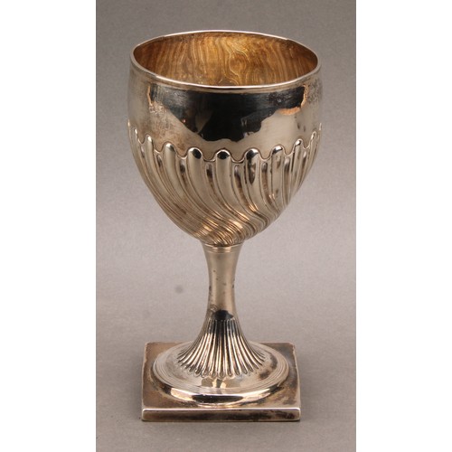 793 - A George III silver wrythen-fluted pedestal goblet, square base, 17.5cm high, George Smith & Thomas ... 