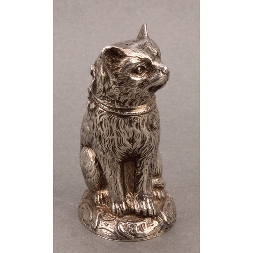 1013 - An early 20th century silver novelty pepper, as a cat, seated, 7.5cm high, import mark for Chester 1... 