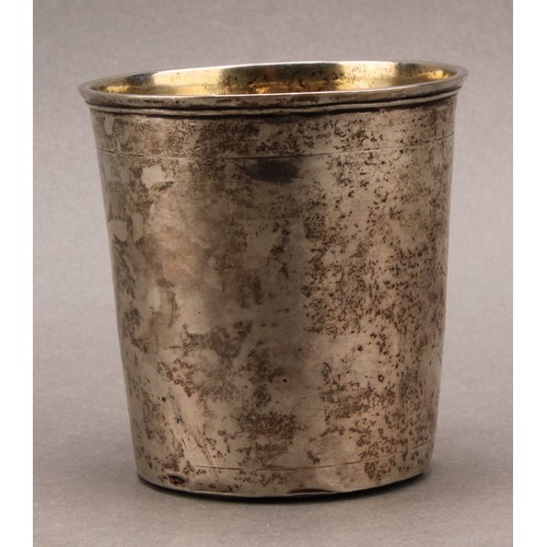 977 - An 18th century Continental silver tapered cylindrical beaker, probably Scandinavian,  gilt interior... 