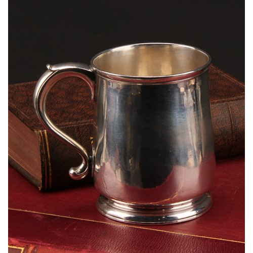 756 - A George I silver mug, quite plain, scroll-capped handle, skirted base, 10.5cm high, Richard Burcomb... 