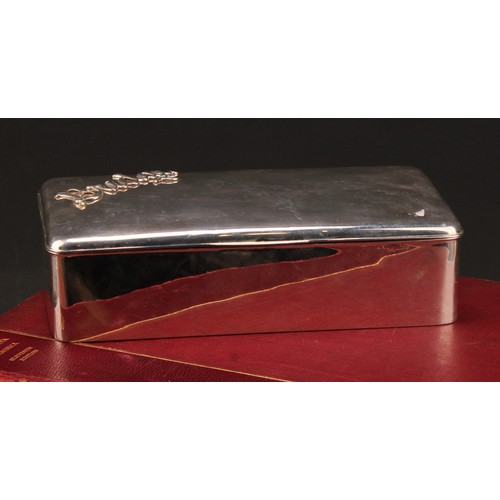 1015 - An early 20th century silver rounded rectangular Bridge box, hinged cover enclosing provision for pl... 