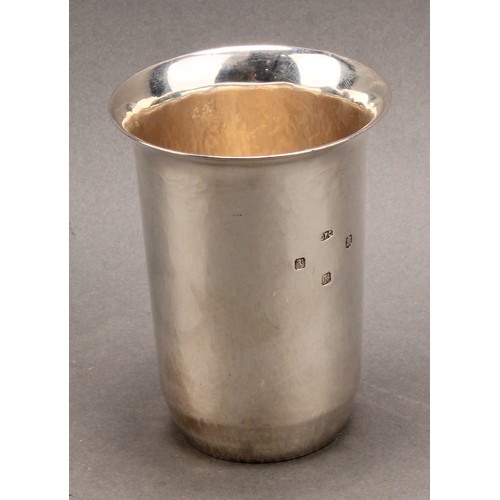 905 - A Scottish Arts and Crafts style silver beaker, flared rim, planished overall, 11cm high, Cecil Fred... 