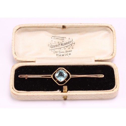 1265 - Two 9ct gold brooches to include; a 9ct gold Etruscan Revival garnet and seed pearl mourning brooch ... 