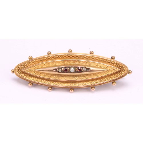 1265 - Two 9ct gold brooches to include; a 9ct gold Etruscan Revival garnet and seed pearl mourning brooch ... 