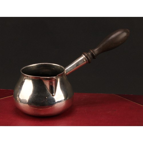 1016 - An early George II silver brandy saucepan, turned fruitwood handle, 21cm long, William Fordham or Wi... 