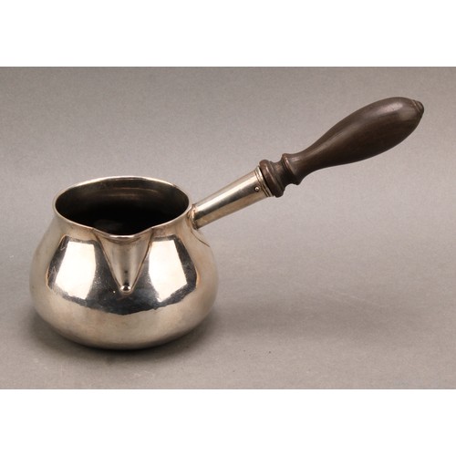 1016 - An early George II silver brandy saucepan, turned fruitwood handle, 21cm long, William Fordham or Wi... 