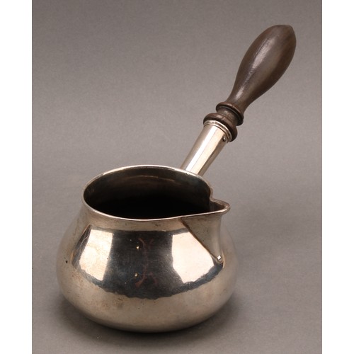 1016 - An early George II silver brandy saucepan, turned fruitwood handle, 21cm long, William Fordham or Wi... 